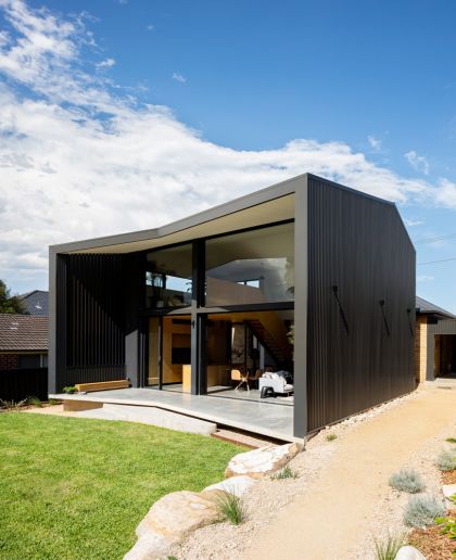 Binary House exterior rear context view