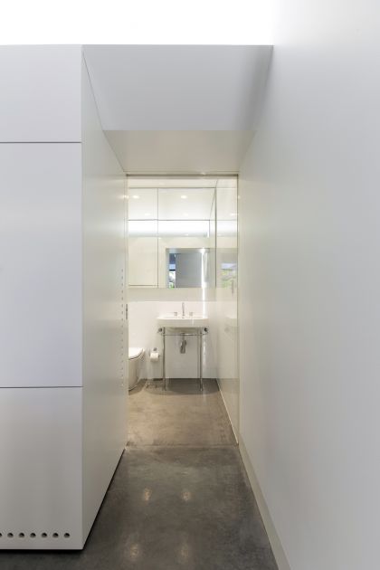 Cosgriff House kitchen joinery & lower ground bathroom beyond
