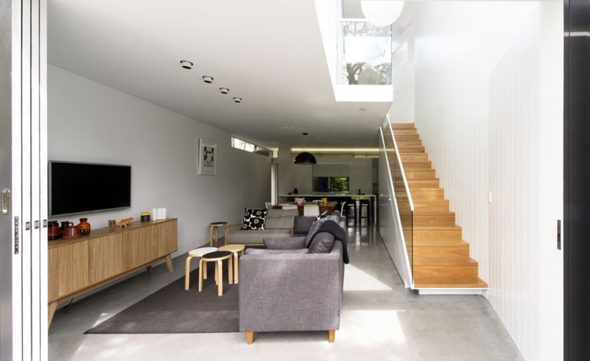 Cosgriff House exterior view to lower ground living room & stair