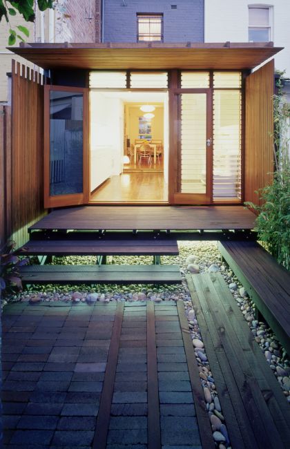 H House exterior rear dusk view