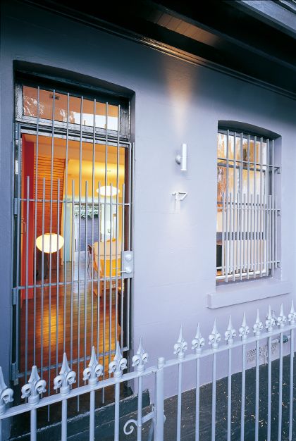 H House front steel grilles & entry detail