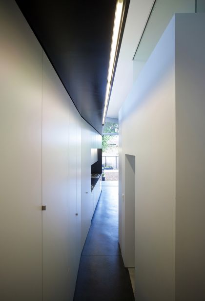 Haines House stair passage, black ceiling & bathroom highlight glazing