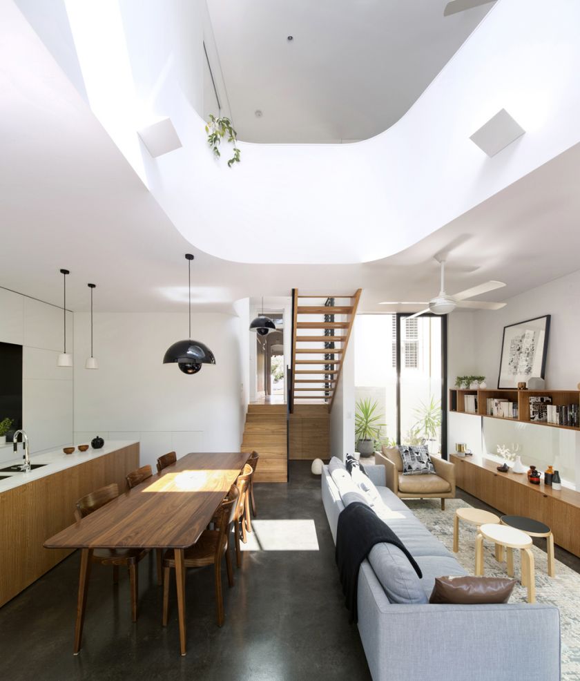 Unfurled House interior view to stair and old house