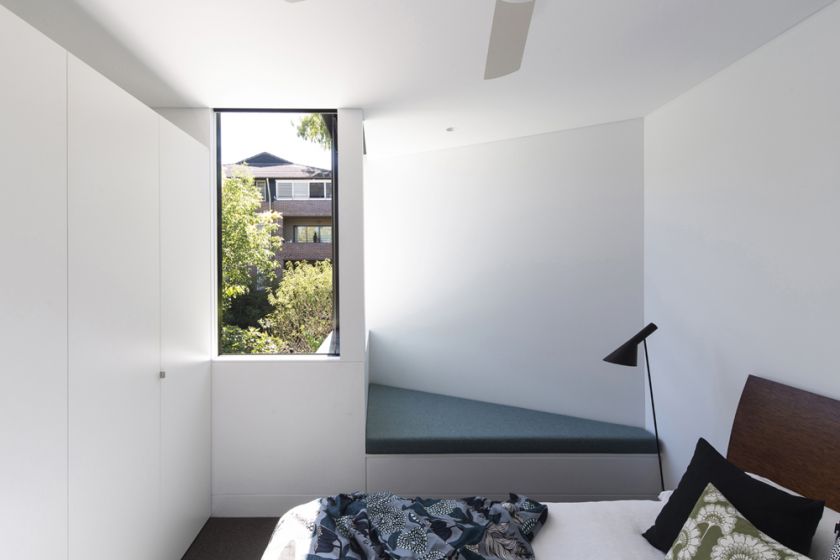 Unfurled House interior view of upper bedroom and projecting wedge