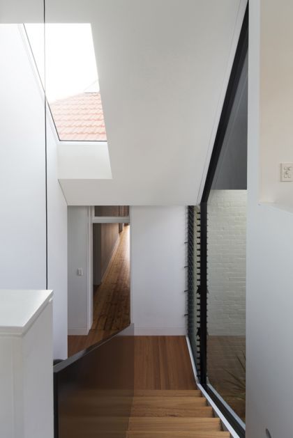 Unfurled House interior view of stair to old house