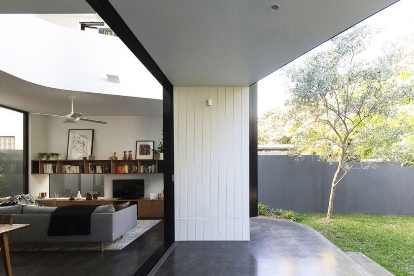 Unfurled House terrace view to interior living space