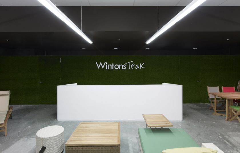 Wintons Teak Showroom sales counter joinery & turf wall