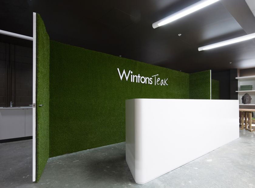 Wintons Teak Showroom sales counter joinery & operable turf wall